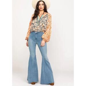 Free People Just Float On Flares bell bottom blue jeans size 29